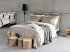 Satin bed linen "Celso de Lemos Bourdon" in 700 Eucalyptus and 101 Natural with tone-on-tone cord embroidery