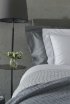 Satin bed linen "Celso de Lemos Bourdon" in 905 Ardoise and 100 White with silver embroidery