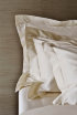 Satin bed linen Celso de Lemos "Capela" in 100 White with standing seam in 101 Naturel