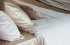 Celso de Lemos Secret" satin bed linen in 101 Naturel, 750 Amande and 500 Nuage Rose