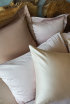 Celso de Lemos Secret" satin bed linen in 101 Naturel, 750 Amande and 500 Nuage Rose